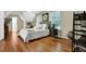 Spacious bedroom offers natural light and hardwood floors at 3909 Laurens Ln, Snellville, GA 30039
