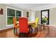Dining room with a mirror, hardwood floors and a view of the kitchen at 3909 Laurens Ln, Snellville, GA 30039