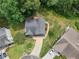 Aerial view of the home, driveway, manicured lawn, and landscaping, showcasing its prime location at 4000 Mcpherson Drive, Acworth, GA 30101