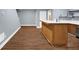 Finished basement bar with wood flooring, custom shelving, and modern finishes at 4000 Mcpherson Drive, Acworth, GA 30101
