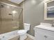 This bathroom features a tile shower with glass doors, a vanity and toilet at 4000 Mcpherson Drive, Acworth, GA 30101