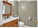 Cozy half-bathroom features stylish vanity and modern fixtures at 4000 Mcpherson Drive, Acworth, GA 30101