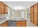 Well-lit kitchen with granite countertop and wooden cabinets at 4000 Mcpherson Drive, Acworth, GA 30101
