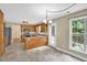 Bright kitchen features tile floor, wooden cabinets and stainless steel appliances at 4000 Mcpherson Drive, Acworth, GA 30101