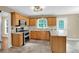 Modern kitchen with stainless steel double oven, granite counters and wooden cabinets at 4000 Mcpherson Drive, Acworth, GA 30101