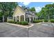 A community pool house surrounded by mature landscaping at 4000 Mcpherson Drive, Acworth, GA 30101
