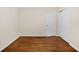 A bedroom with hardwood floors, two closets and baseboard trim at 4400 Hickory Wood Ln, Atlanta, GA 30360