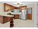 Well-lit kitchen with stainless steel appliances and wood cabinets at 4400 Hickory Wood Ln, Atlanta, GA 30360