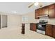 Charming kitchen with stainless steel appliances and a breakfast bar at 4400 Hickory Wood Ln, Atlanta, GA 30360