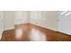 Inviting living room with gleaming hardwood floors and neutral paint at 4400 Hickory Wood Ln, Atlanta, GA 30360