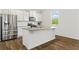 Kitchen featuring stainless steel appliances and large island at 150 Ivy Chase Loop, Dallas, GA 30157