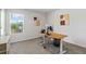 Office space with a modern desk setup, a large window, and a sleek design at 150 Ivy Chase Loop, Dallas, GA 30157