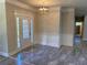 Charming entryway with decorative molding, tile flooring, and natural light from the front door at 5950 Lynfield Dr, Atlanta, GA 30349