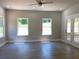 Bright living room featuring large windows and hardwood floors with ample natural light at 5950 Lynfield Dr, Atlanta, GA 30349
