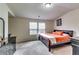 Comfortable bedroom with two windows, soft carpet, and ample closet space at 1155 Magnolia Gardens Walk, Mcdonough, GA 30253
