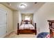 Bedroom featuring a bed, window, and a dresser at 1155 Magnolia Gardens Walk, Mcdonough, GA 30253