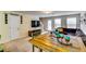 Open-concept living space with comfortable seating, dining area, and neutral tones at 1155 Magnolia Gardens Walk, Mcdonough, GA 30253