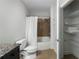 This bathroom features a shower/tub and a door leading to shelving for storage at 325 E Paces Ferry Ne Rd # 313, Atlanta, GA 30305