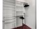 This walk-in closet includes shelving and hanging storage for optimal organization at 325 E Paces Ferry Ne Rd # 313, Atlanta, GA 30305