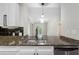 Kitchen with granite countertops and stainless steel dishwasher, sink and faucet at 325 E Paces Ferry Ne Rd # 313, Atlanta, GA 30305