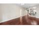 Spacious open-concept floor plan with hardwood floors leading to a kitchen area at 325 E Paces Ferry Ne Rd # 313, Atlanta, GA 30305