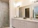 Modern bathroom with marble shower and double sink vanity at 3734 Paige Ne Way # 10, Atlanta, GA 30319