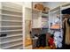 Walk-in closet with custom shelving and rod storage offers ample space for clothing and accessories at 3734 Paige Ne Way # 10, Atlanta, GA 30319