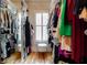 Spacious walk-in closet featuring built-in shelving and natural light at 3734 Paige Ne Way # 10, Atlanta, GA 30319