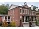 Stunning brick townhouse with a covered porch and balcony, perfect for enjoying the outdoors at 3734 Paige Ne Way # 10, Atlanta, GA 30319