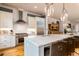 Spacious kitchen featuring a center island with bar seating and stainless steel appliances at 3734 Paige Ne Way # 10, Atlanta, GA 30319