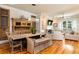 Spacious living and dining room with hardwood floors and a cozy fireplace at 3734 Paige Ne Way # 10, Atlanta, GA 30319