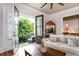 Bright living room featuring doors that open onto a porch at 3734 Paige Ne Way # 10, Atlanta, GA 30319