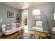 Comfortable home office with seating, glass desk, and access to outdoor area at 3734 Paige Ne Way # 10, Atlanta, GA 30319