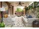 Inviting covered patio with comfortable seating and a cozy fire pit at 3734 Paige Ne Way # 10, Atlanta, GA 30319