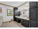 Bright bathroom featuring double sinks, and a tub at 3765 Cannonwolde Dr, Snellville, GA 30039