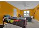 This bedroom is spacious and features carpet floors and natural light at 3765 Cannonwolde Dr, Snellville, GA 30039