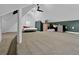 This bedroom is large and features high ceilings, carpet, and natural light at 3765 Cannonwolde Dr, Snellville, GA 30039