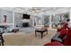Bright living room features a stone fireplace and plush seating area at 3765 Cannonwolde Dr, Snellville, GA 30039