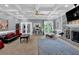 Elegant living room with stone fireplace and comfortable seating arrangement at 3765 Cannonwolde Dr, Snellville, GA 30039