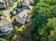 Aerial view of the property with a fenced in backyard and elevated deck at 4022 Roberts Crest Dr, Suwanee, GA 30024