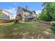Large backyard includes a playset and ample space at 4022 Roberts Crest Dr, Suwanee, GA 30024