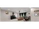 Finished basement features a projector, screen, comfortable seating, and natural light coming through the windows at 4022 Roberts Crest Dr, Suwanee, GA 30024