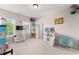 Bright bedroom with natural light from the window and decorated with colorful accessories, a true paradise at 4022 Roberts Crest Dr, Suwanee, GA 30024