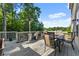 Outdoor deck with furniture and room for dining at 4022 Roberts Crest Dr, Suwanee, GA 30024