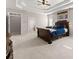 Bright main bedroom featuring tray ceilings, carpet, and a large bed, offering a relaxing retreat at 4022 Roberts Crest Dr, Suwanee, GA 30024