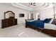 Large main bedroom showcasing a tray ceiling, carpet, and ample space for a dresser and other furnishings at 4022 Roberts Crest Dr, Suwanee, GA 30024