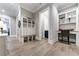 Hallway with built-in storage, a desk area, and access to a bathroom creating a functional and organized space at 00 Memory Ln, Canton, GA 30115