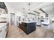 Spacious kitchen with an island, stainless steel appliances, and an open layout to the living room with fireplace at 00 Memory Ln, Canton, GA 30115
