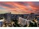 Spectacular aerial view showcasing the city skyline at sunset, providing a captivating backdrop for luxury living at 1065 Peachtree Ne St # 3504, Atlanta, GA 30309