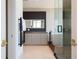 Modern bathroom featuring sleek cabinets, a vanity mirror, and a glass-enclosed shower for a spa-like experience at 1065 Peachtree Ne St # 3504, Atlanta, GA 30309